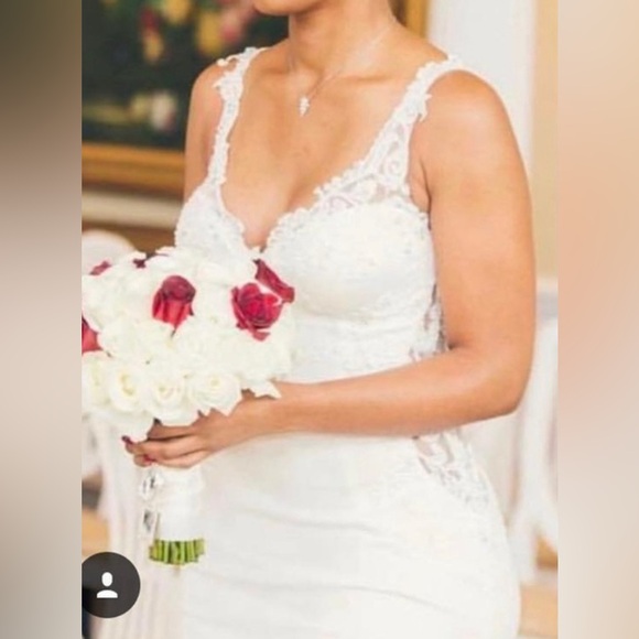 Demetrios Bridal Gown
Color: Ivory Size:10
button covered zipper back - Picture 2 of 6